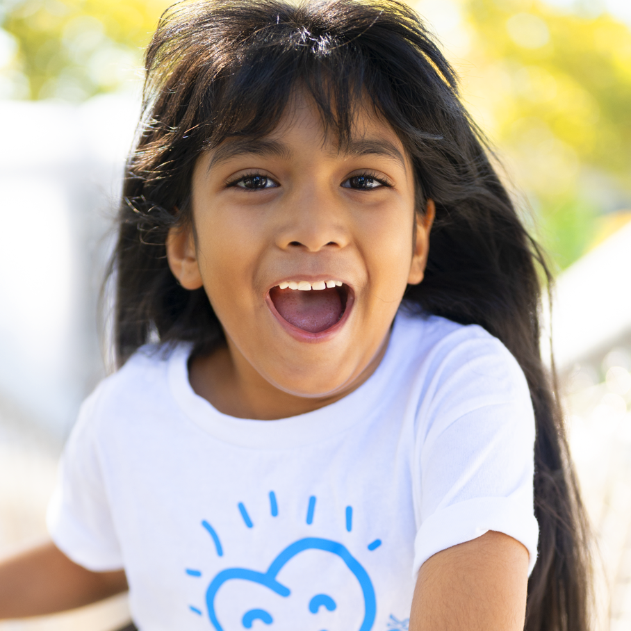 Happy kid after dental cleaning done at sky dental kids